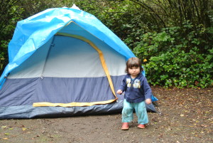 Polina next to our tent in September 2013, wearing the same pants.