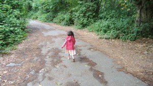 Running barefoot through the park.