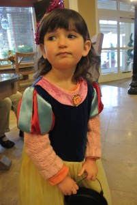 Polina in a Snow White outfit (but calling herself Cinderella.)