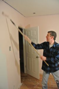 Peter painting Polina's room pink.