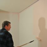 Peter painting Polina's room pink.