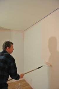 Peter painting Polina's room pink.