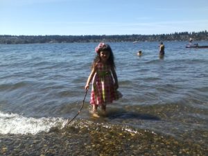 Polina standing in Lake Washington.