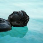 Buddha floating on water.