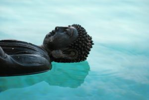 Buddha floating on water.